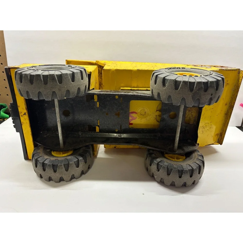 Vintage 1970s Mighty Tonka Dump Truck XMB-975 Pressed Steel Yellow Heavy Duty